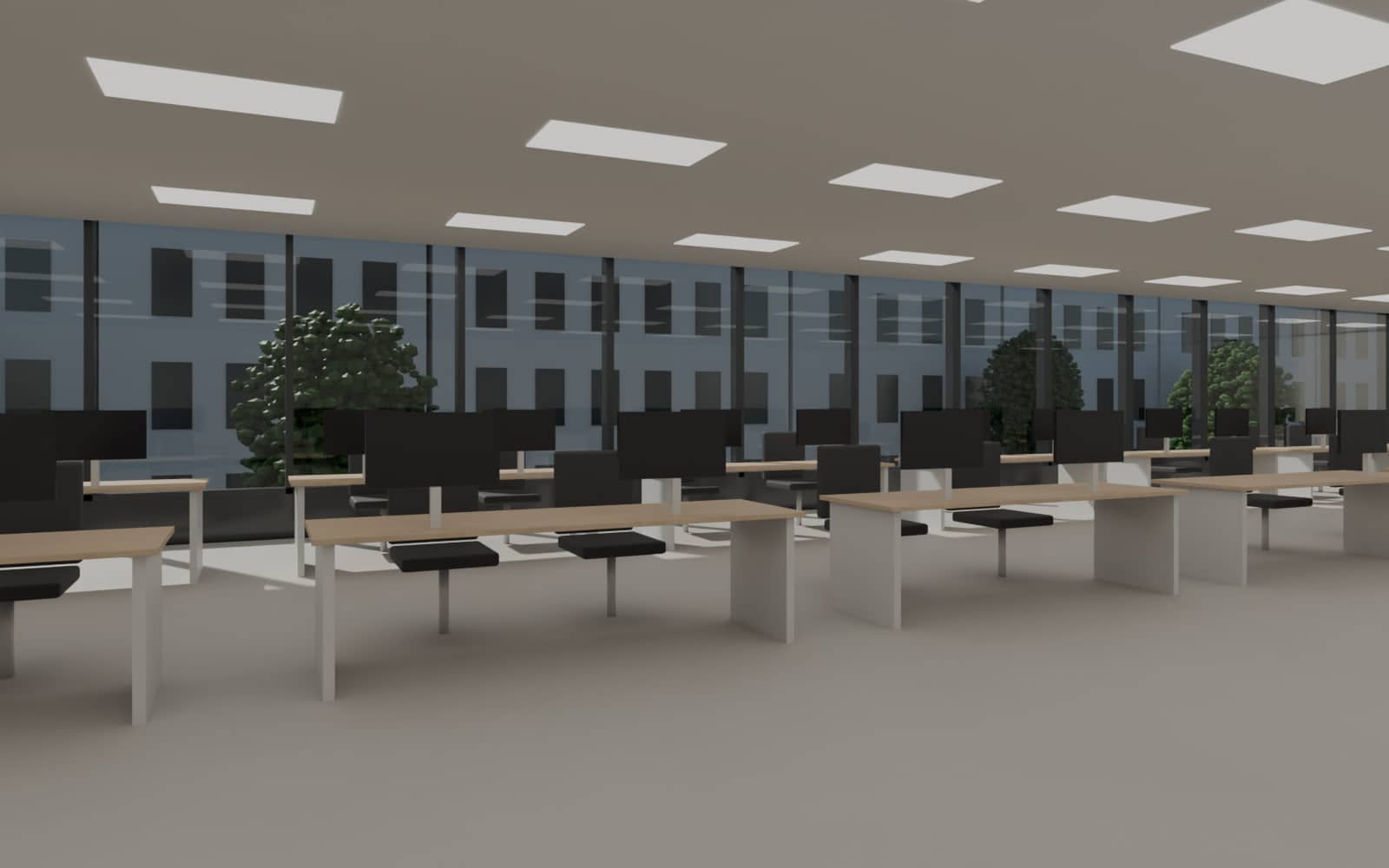 Plateau de bureaux baigné de lumière derrière une façade vitrée
